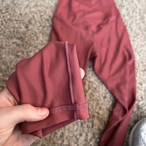 NEW NEVER WORN LEGGINGS! By Pink Lily!! Size Small! And its a dark pink color!!